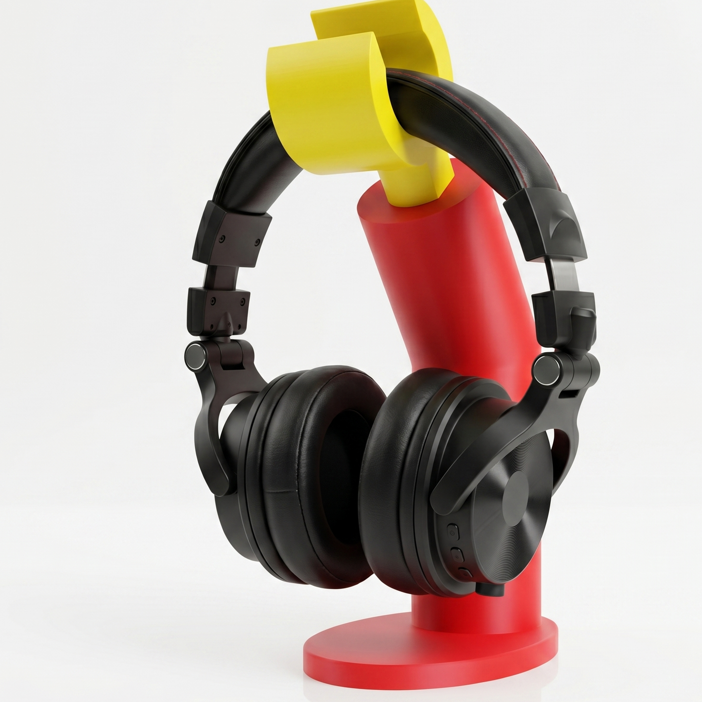 Black headphones on a red and yellow stand with 'Level One Loot' branding.