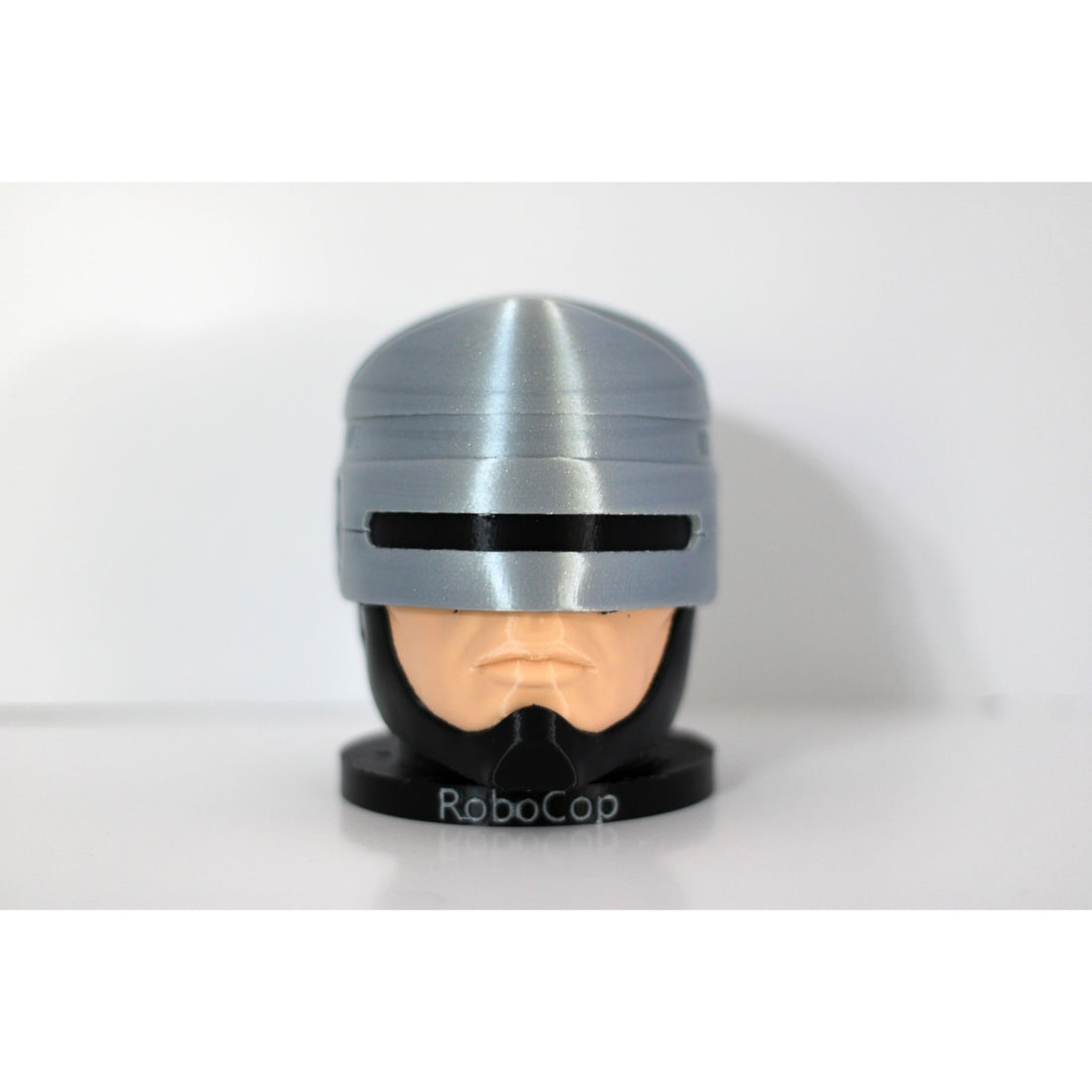 Cyborg cop helmet bust controller holder as a battlestation centerpiece