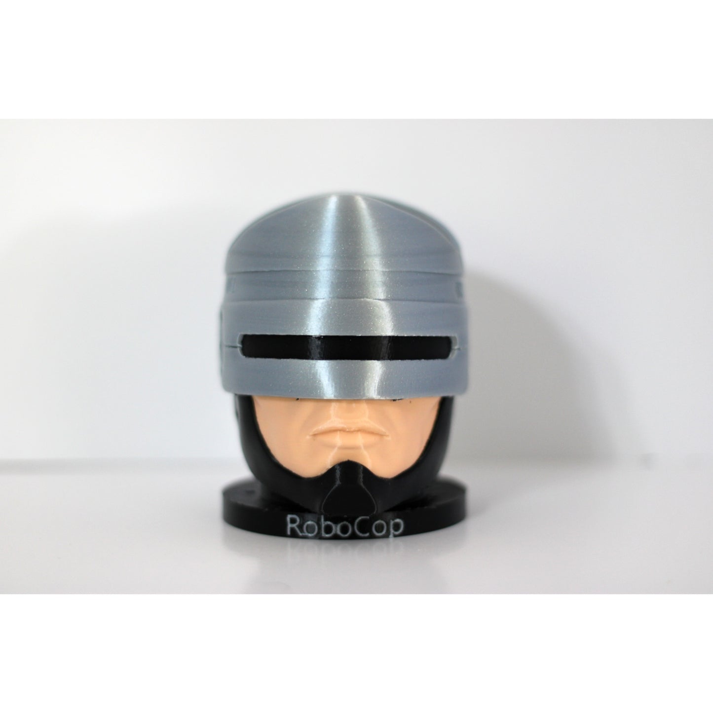RoboCop-Inspired Controller Holder — Sculpted Helmet Bust Display Stand | PS5 & Xbox